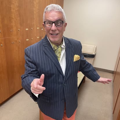David Bradshawe in a pinstripe suit