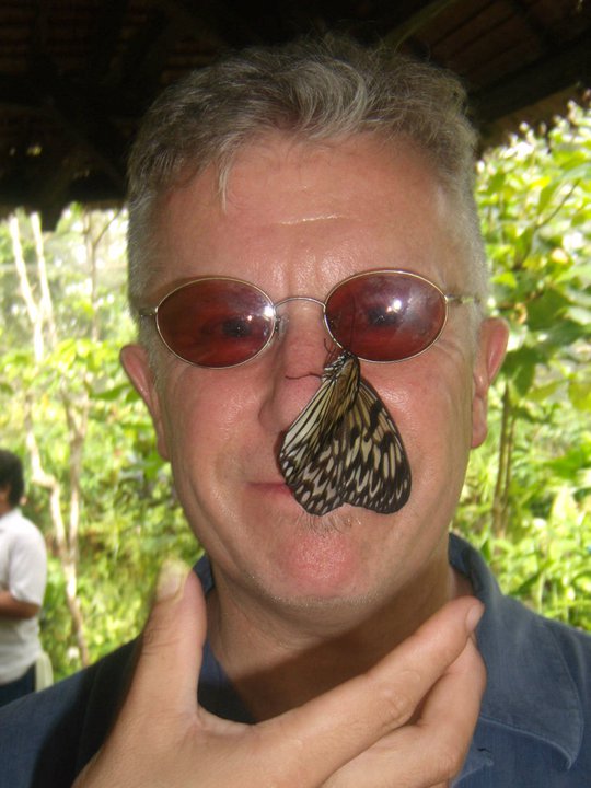 David Bradshawe with a butterfly on his nose